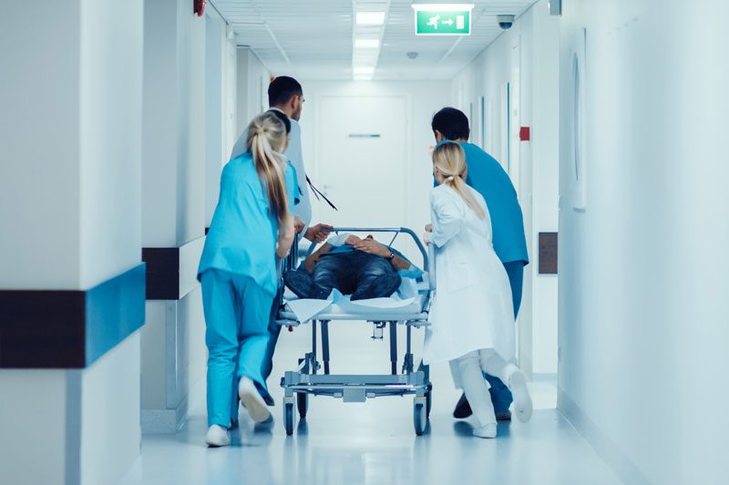 Nurses and doctors using slip-resistant and safety shoe to avoid injuries on the workplace